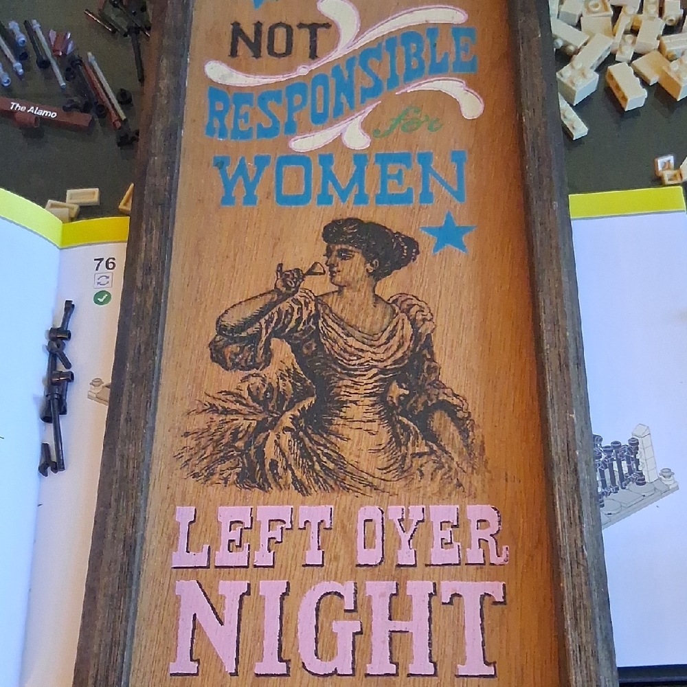 "NOT RESPONSIBLE FOR WOMEN LEFT OVERNIGHT" WOODEN SIGN